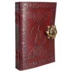 Vintage embossed leather journal with Celtic-inspired border, pentagram design, and antique-style metal clasp