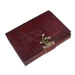 Vintage embossed leather journal with Celtic-inspired border, pentagram design, and antique-style metal clasp